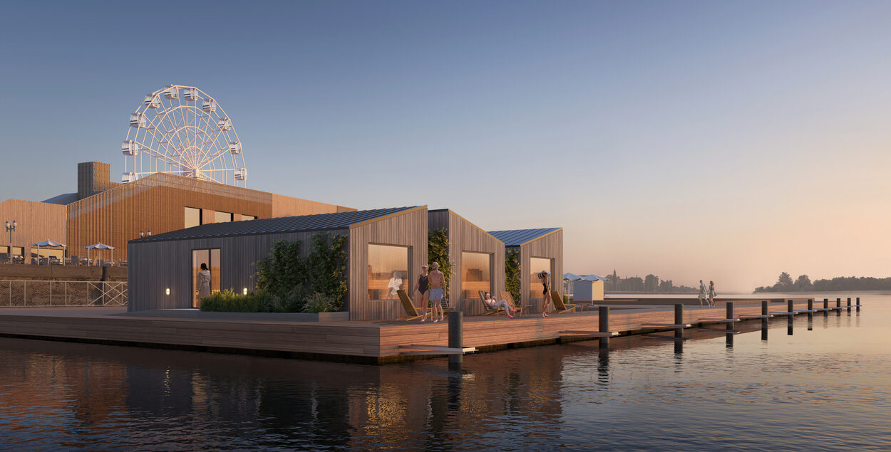 Three sauna buildings on a floating platform.